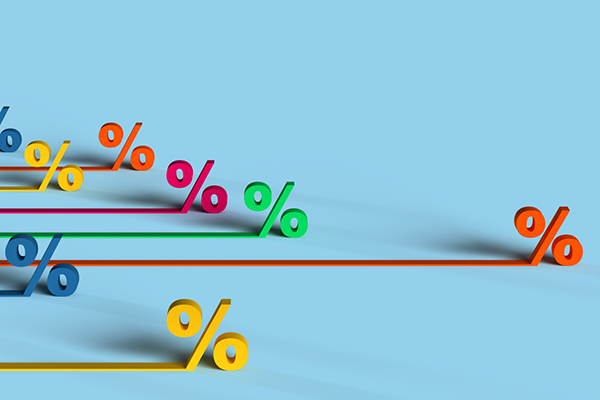 Per cent signs in different colours against a blue background