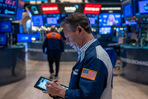 A trader on the floor of the New York Stock Exchange, Getty