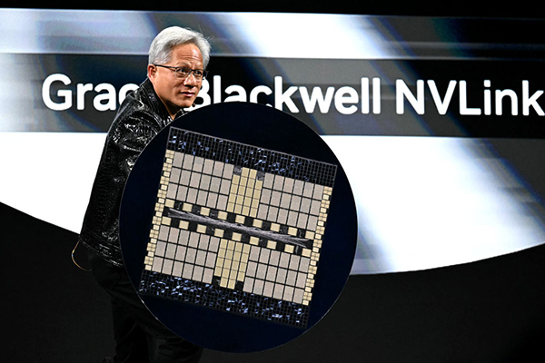 Nvidia CEO Jensen Huang holds a Grace Blackwell NVLink72, Getty