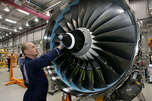 Rolls-Royce worker in aircraft engine factory in Berlin, Getty