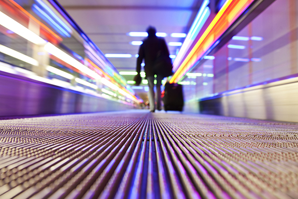 Flat escalator in an airport