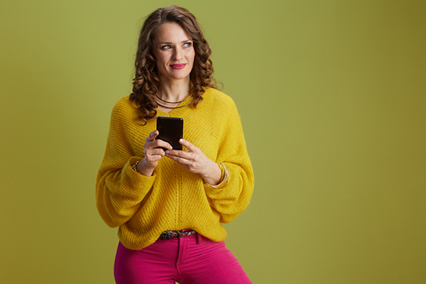 Woman considering a decision about buying shares