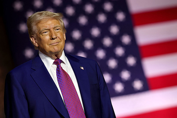 Donald Trump and the US flag, Getty