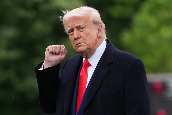 Donald Trump performing a fist pump, Getty