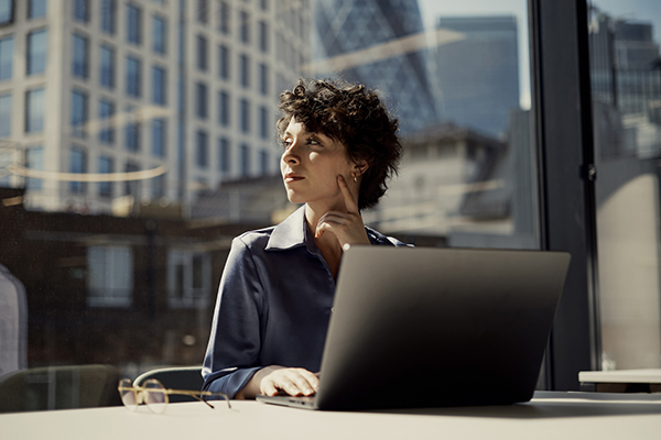 Worker sitting in the office, Getty
