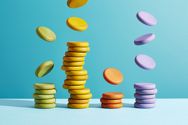 Falling coins representing dividends, Getty