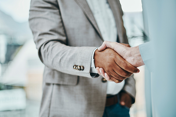 Two people shaking hands