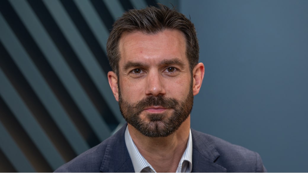 Headshot of Personal Finance Editor Craig Rickman