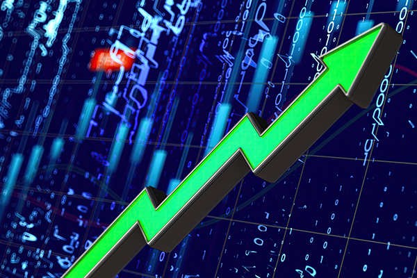 Green up arrow and a stock market chart