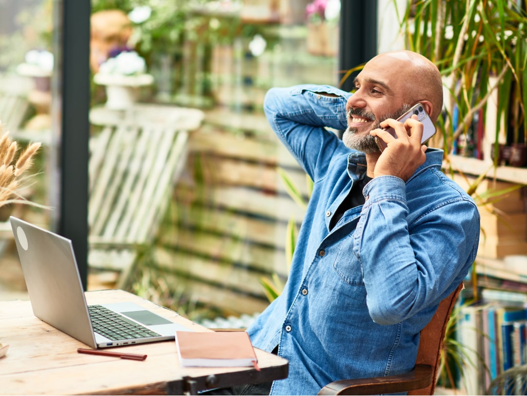 Man speaking to his adviser about pensions for the self-employed