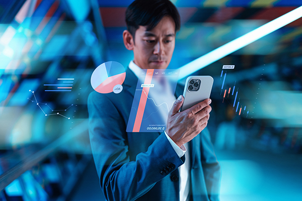 Man studying markets on his mobile