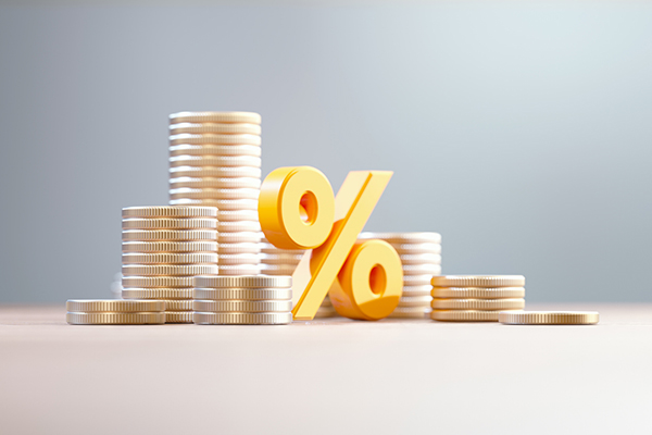 Yellow percentage sign and coin stacks