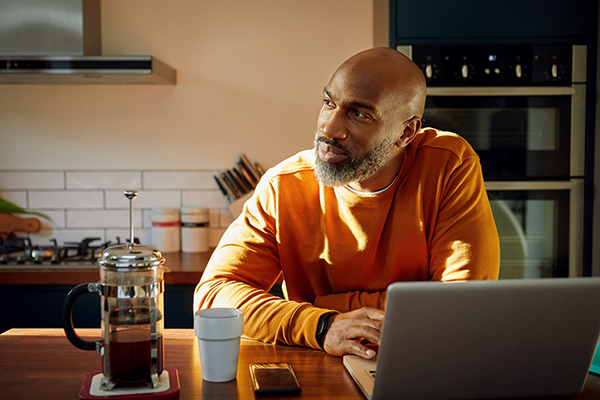 Man looking to the side making a decision, Getty
