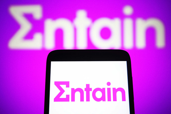 Entain logo on smartphone, Getty