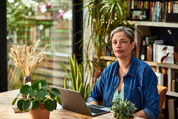 A woman making a decision about a dividend stock