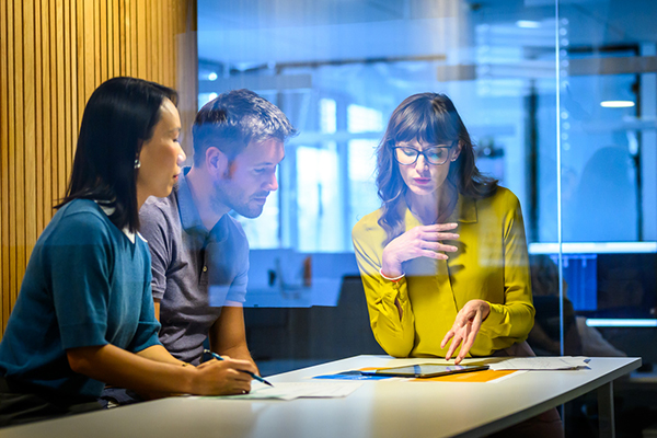 Three fund investors studying data