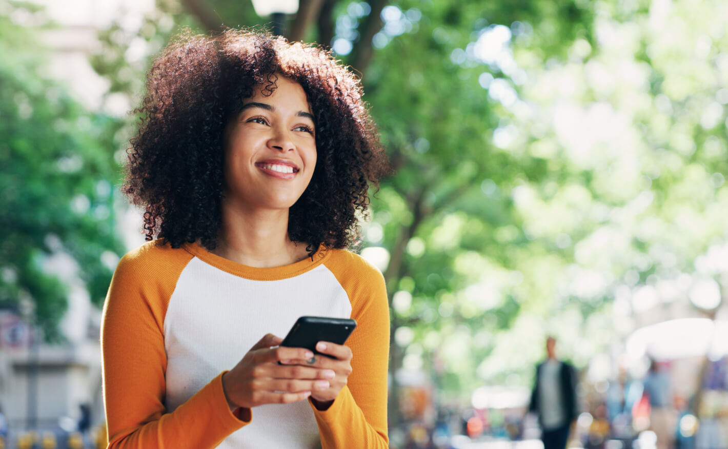 Lady holding mobile device