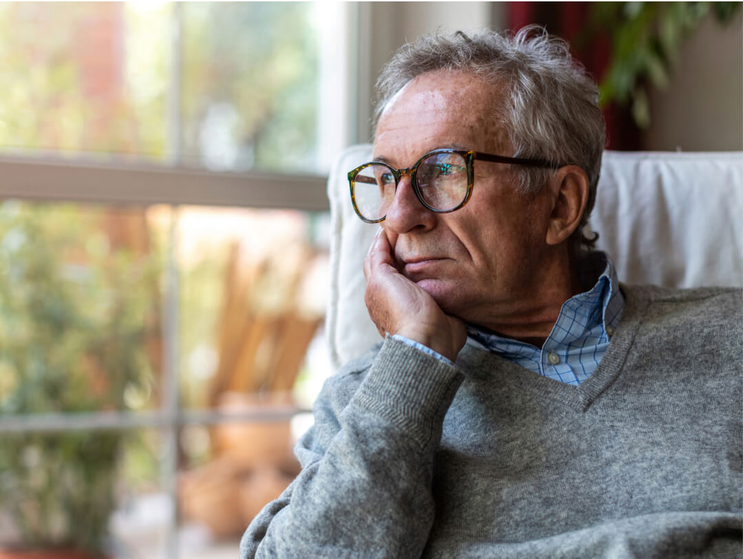 Retiree looking out the window