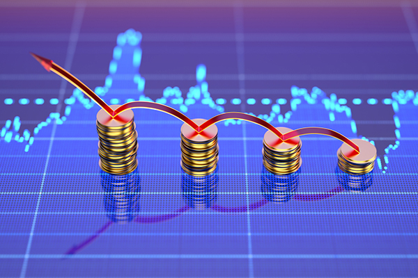Coins and market graph showing coins trebling in value