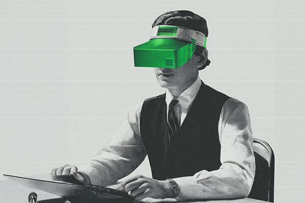 Black and white photo of worker wearing VR headset