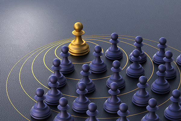A gold pawn among purple pawns