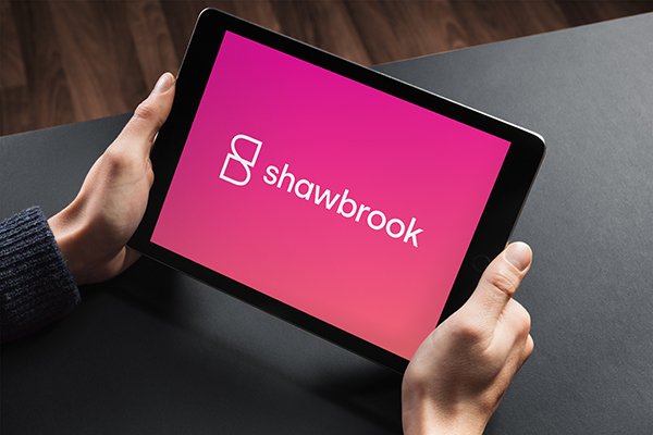 Pink Shawbrook logo on a screen