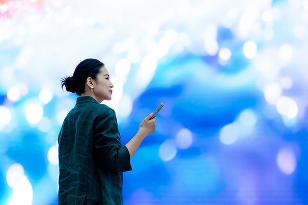 Asian businesswoman with smartphone