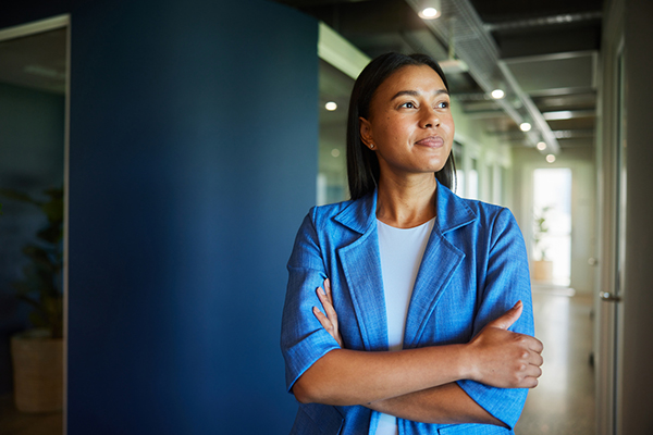 Worker with arms folded