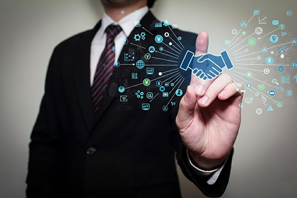 Seeking a merger, investor pressing button with handshake image