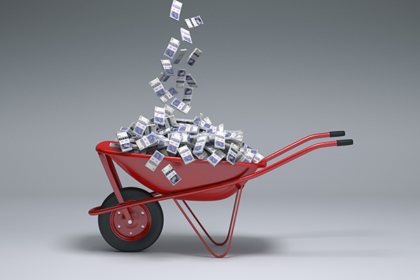 Wheelbarrow full of banknotes