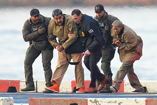 Nicolas Maduro with federal agents, Getty