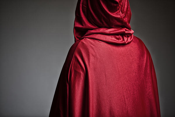Traitors red cloaked figure