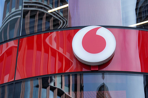 Vodafone logo on shop, Getty