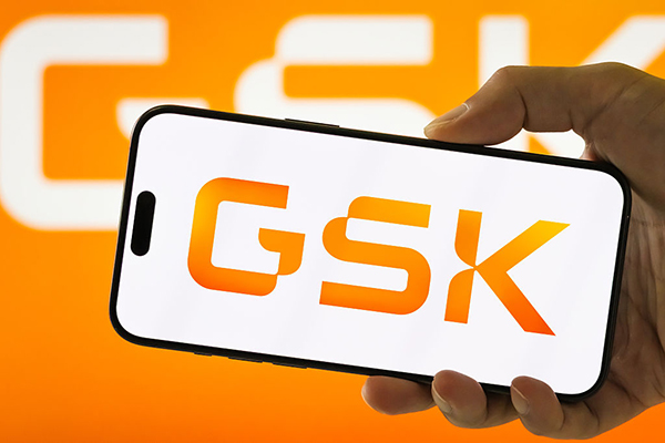 GSK logo on a smartphone, Getty