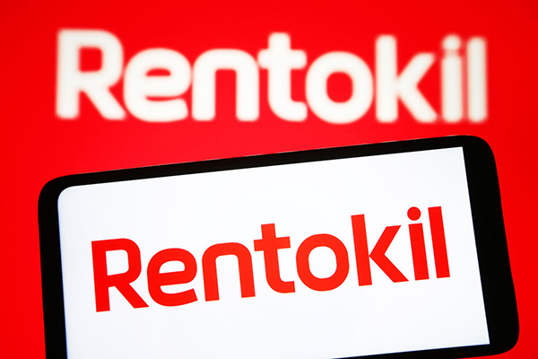 Rentokil logo on a smartphone, Getty