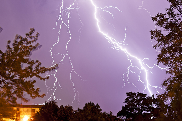 Lightning bolts in a purple sky