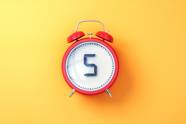 A clock with number 5 inside it