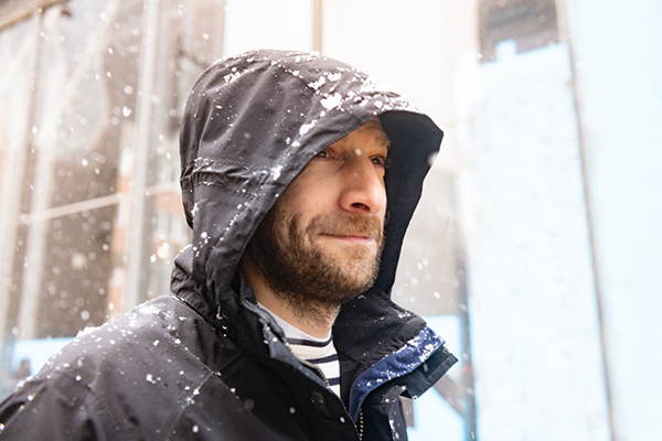 Investor sheltering from the snow