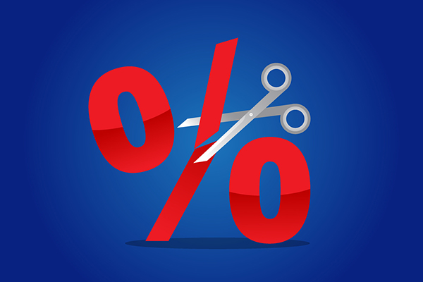 Scissors slicing through a red percentage sign
