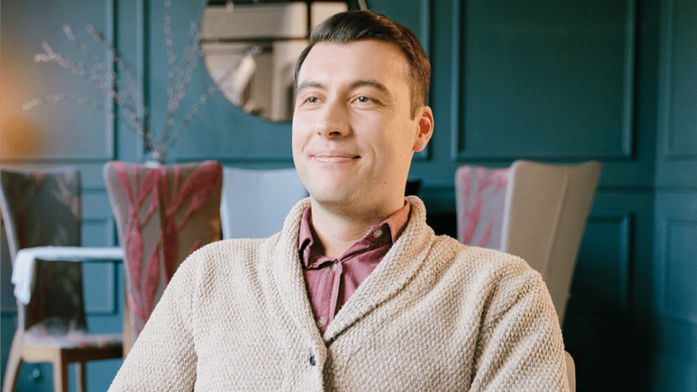 Man sat in his living room