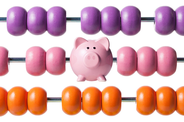 Colourful child's abacus with piggy bank in middle