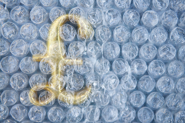 Pound symbol beneath bubble wrap