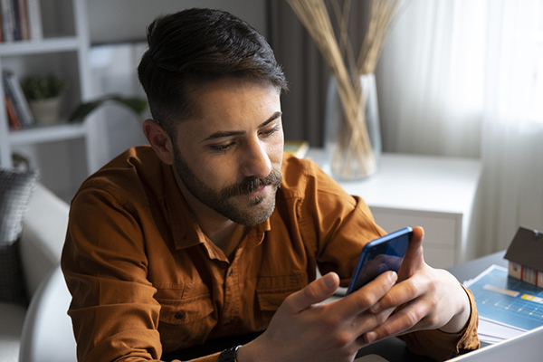 Investor studying trade on phone