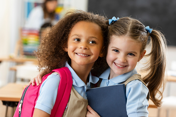 Two girls in school uniforms