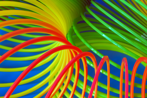 Coloured coiled shock absorber