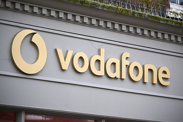 Vodafone sign in gold in UK, Getty