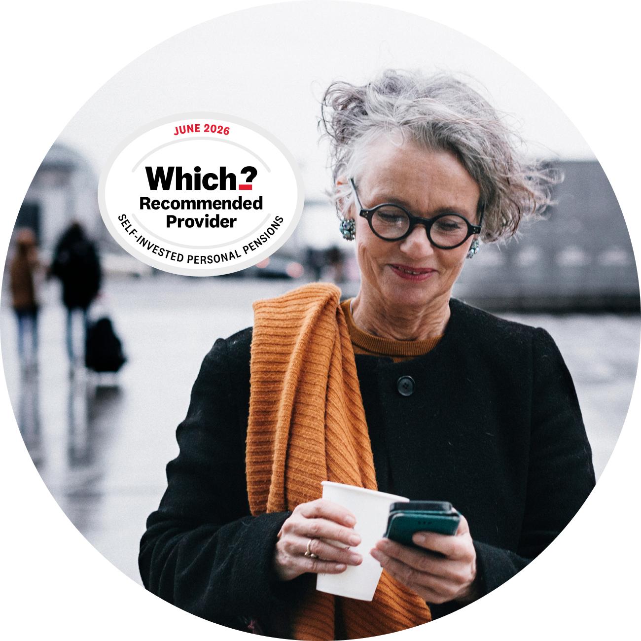 Lady looking at her mobile device with Which? Recommended Provider award