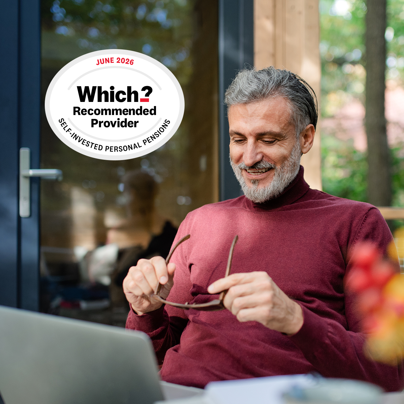 Man sat outside with laptop, which recommended provider 2026