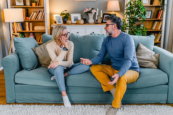 Retired couple discussing inflation and rates