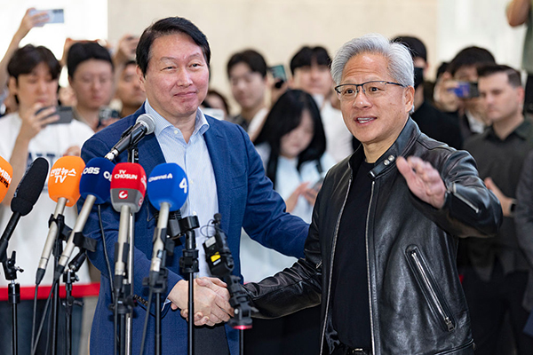 NVIDIA CEO Jensen Huang and SK Group chair Chey Tae-won, Getty